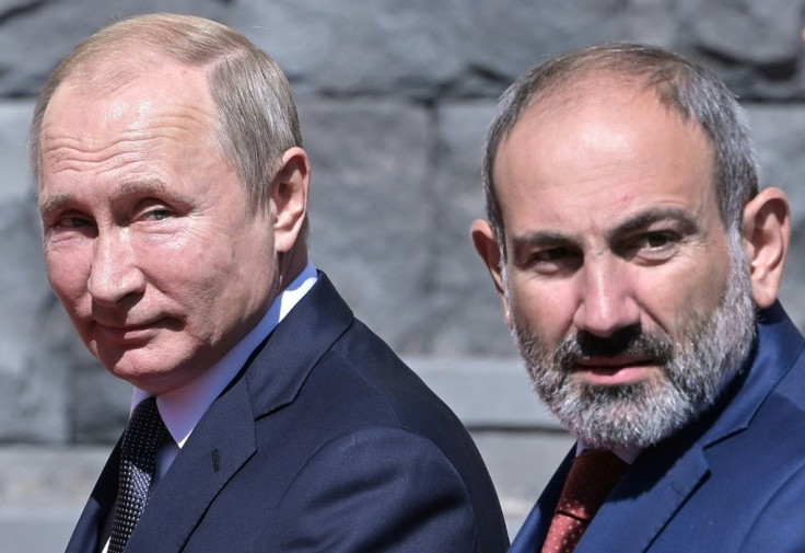 Russia's President Vladimir Putin (L) is a key ally of Armenia's Prime Minister Nikol Pashinyan (R)