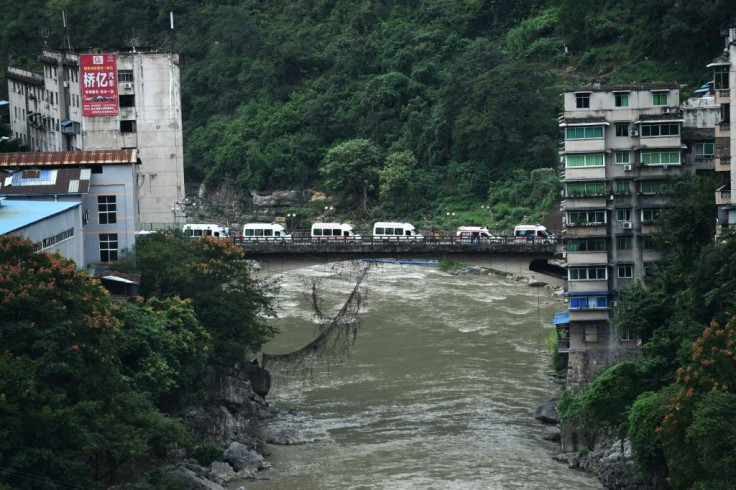 A convoy of ambulances outside the Songzao coal mine