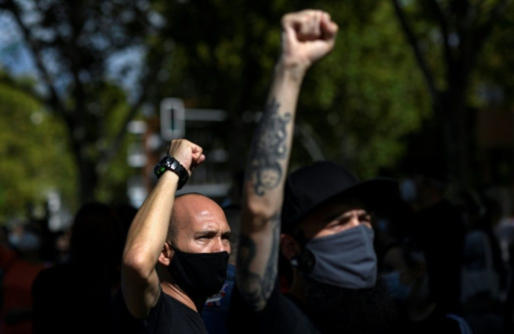 Demonstrators are angry about uneven lockdowns across the Spanish capital region