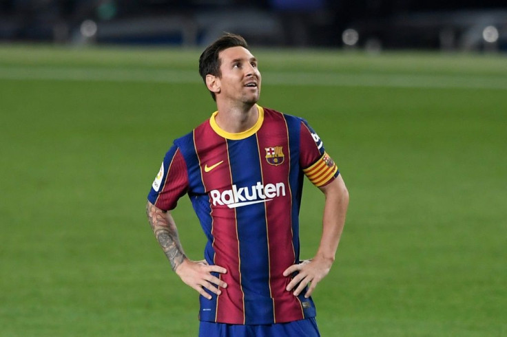 Lionel Messi was all smiles on Sunday despite trying to leave Barcelona in the close season