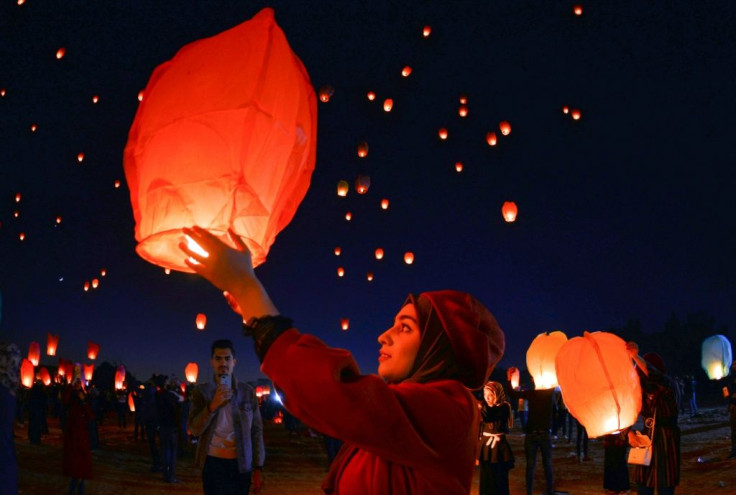 Iraqis in the holy shrine city of Najaf launch rice paper hot air balloons in December 2019 to show their solidarity with anti-government protests across the country