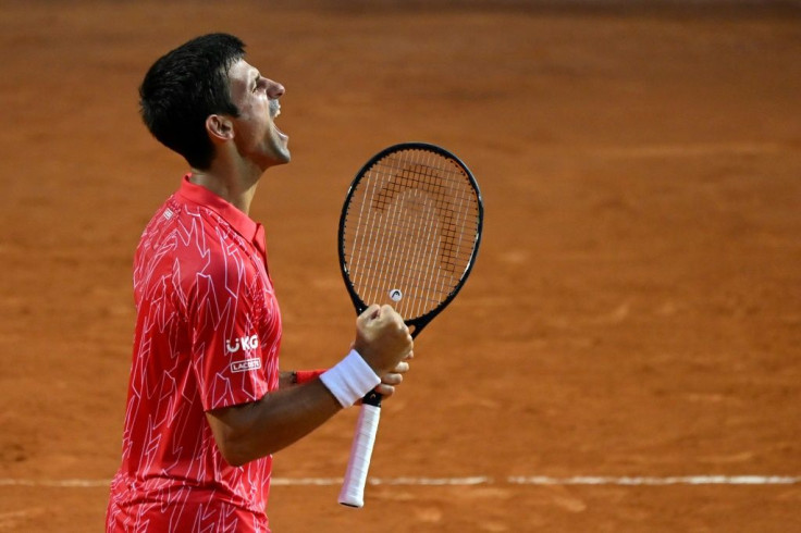 Best behaviour: Novak Djokovic celebrates after winning in Rome