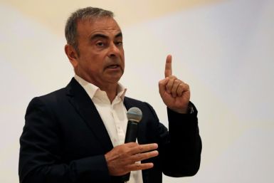 Fugitive auto tycoon Carlos Ghosn refused to answer any questions about the charges against him in Japan as he launched a business programme at a Lebanese university in his first public appearance in months