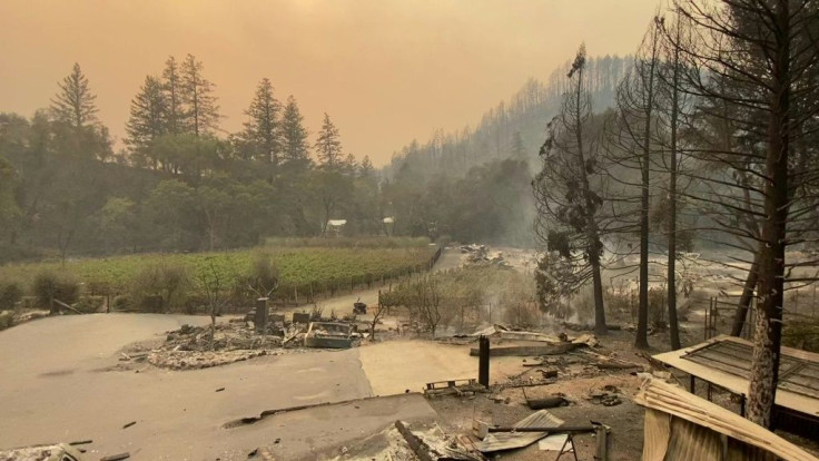 The Glass Fire spread from 1,500 acres to more than 15,000 acres overnight, leaving charred cars and a burnt down elementary school in its wake.