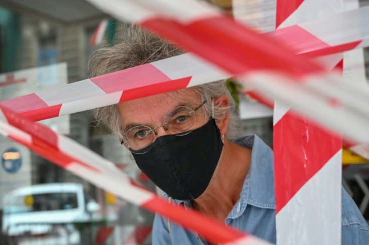 Deputy Rector Laszlo Upor seen behind the blockade