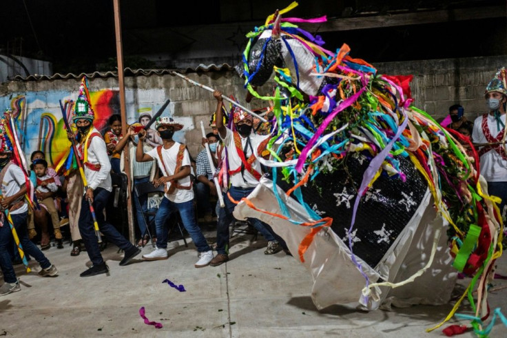 Members of the Afro-Mexican community perform the Dance of the Straw Bull
