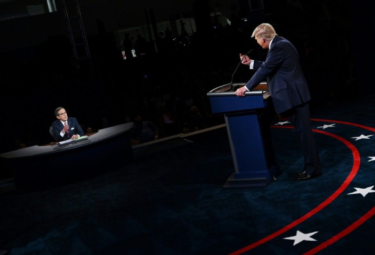 Moderator and Fox News anchor Chris Wallace (L) repeatedly asked US President Donald Trump to respect the debate rules -- to little effect