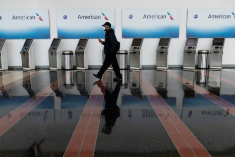 American Airlines is to start furloughing thousands of workers on October 1, the company said