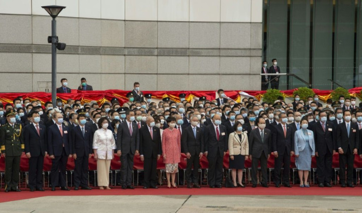 Hong Kong Chief Executive Carrie Lam and other officials attend a flag raising ceremony to mark China's National Day in Hong Kong