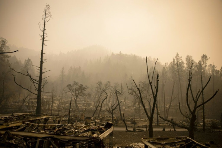 The remains of the guest houses at Calistoga Ranch smoulder after the Glass Fire passed through