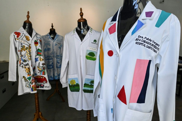 White coats used by doctors fighting Covid-19 have been transformed into art that will be auctioned