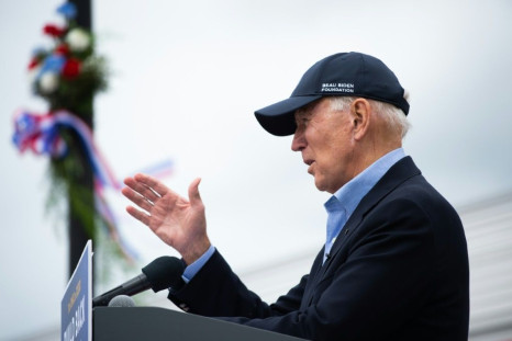 Democratic presidential candidate Joe Biden wearing a baseball cap with the logo of his late son Beau's foundation to help protect children from abuse