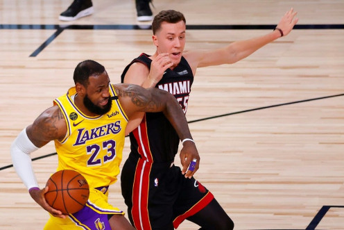 Los Angeles star LeBron James drives to the basket against Miami's Duncan Robinson in the Lakers' dominant victory over the Heat in game one of the NBA Finals