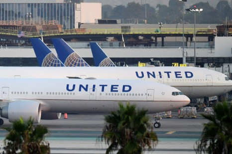 United Airlines is moving ahead with thousands of layoffs, despite a new government loan deal