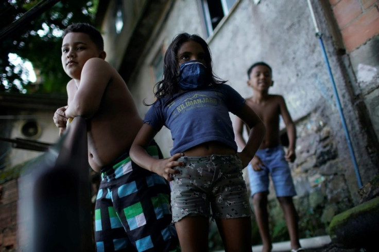 There are few resources for children like these in the Santa Marta favela, or slum, of Rio de Janeiro to take online classes