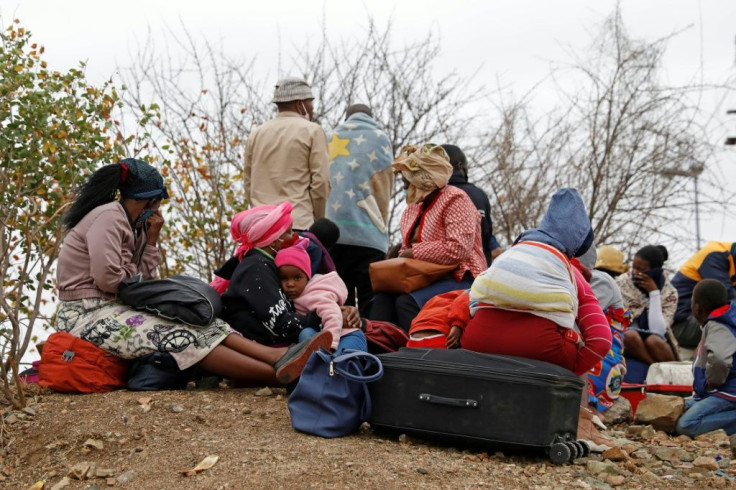 Zimbabweans await their fate after being caught trying to cross into South Africa to buy groceries