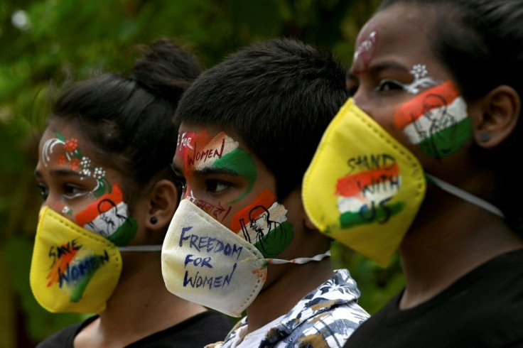 Students protest the alleged gang-rape of a  19-year-old woman in India's Uttar Pradesh state