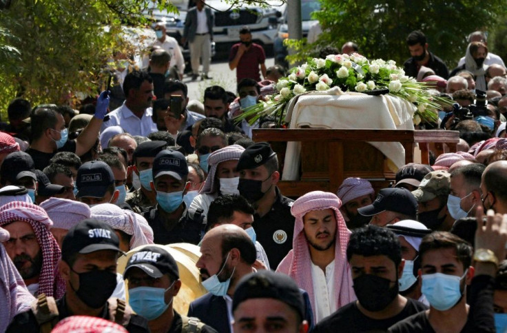 The funeral procession of Yazidi spiritual leader Baba Sheikh Khurto Hajji Ismail passes through the Iraqi town of Sheikhan,one  of the centres of the often persecuted religion