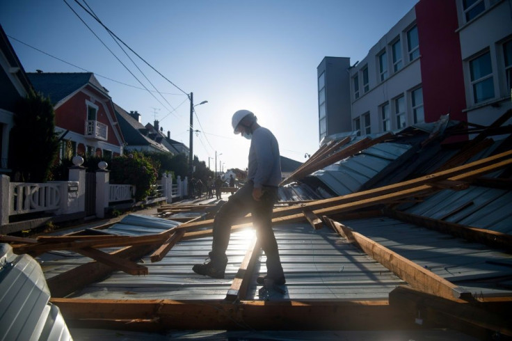 Winds from the storm dubbed Alex tore off part of a school's roof in Vannes, western France.