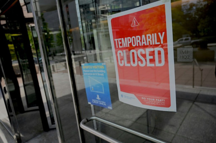 The "Temporarily Closed" sign at the IMF HQ2 building has been hanging there for more than six months