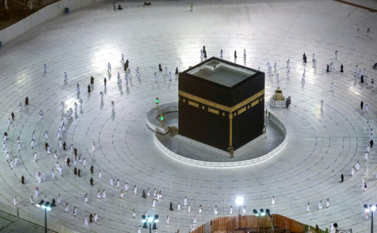 Worshippers circumambulate the Kaaba in the Grand Mosque complex in the Saudi city of Mecca, on October 4, 2020, as authorities partially resume the year-round umrah for a limited number of pilgrims amid the coronavirus pandemic