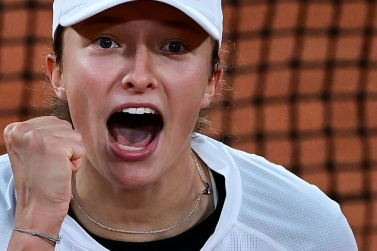 Shock victory: Poland's Iga Swiatek celebrates defeating Simona Halep