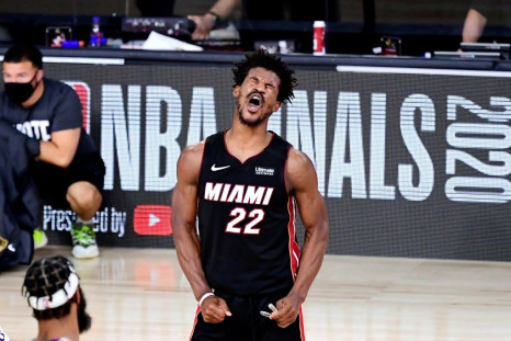 Miami's Jimmy Butler delivered a 40-point triple-double as the Heat clawed back a victory in the NBA Finals with a 115-104 game-three win over the Los Angeles Lakers