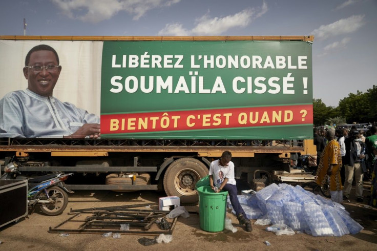 A picture taken in July  shows a banner reading "Free the Honorable Soumaila Cisse ! When is soon ?"