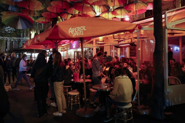 Bars in Paris have continued to draw large crowds of people often flouting physical distancing and mask-wearing guidelines