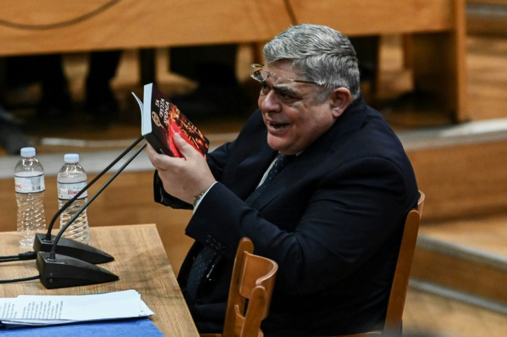 Golden Dawn party leader Nikolaos Michaloliakos testifies before the criminal court in Athens on November 6, 2019.