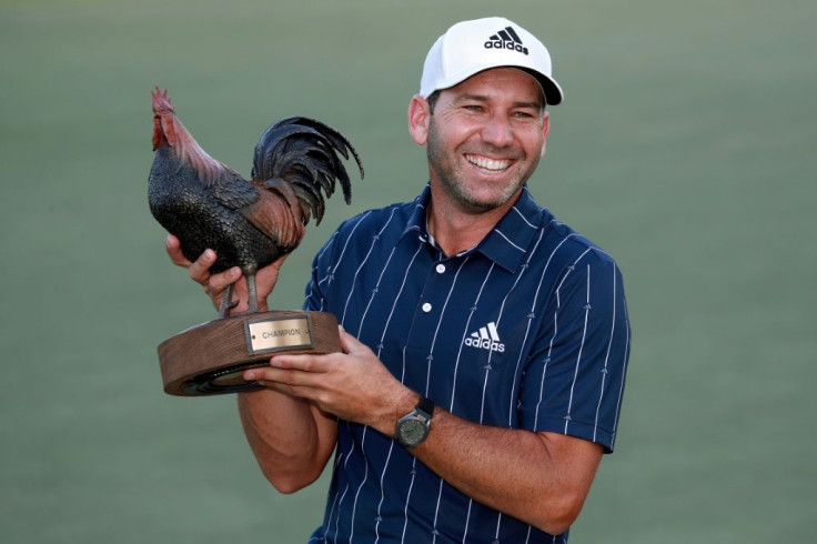 Sergio Garcia of Spain celebrates with the trophy after winning the Sanderson Farms Championship - he has now won in four different decades