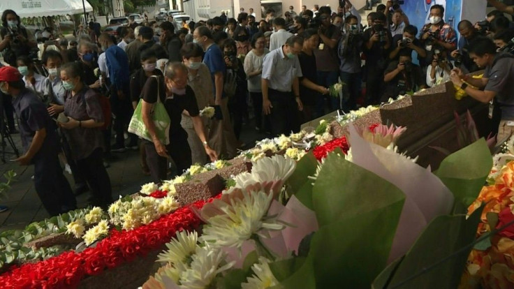 Thai politicians and protest leaders lay floral wreaths on a monument to commemorate the anniversary of a student massacre more than 40 years ago, as survivors reflect on the younger generation's latest democracy push.
