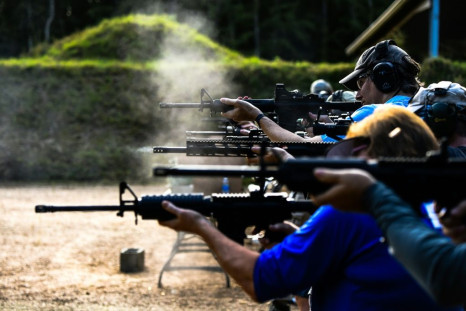 Students fire AR-15 semi-automatic rifles at the Boondocks Firearms Academy in Jackson, Mississippi