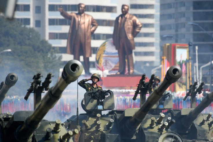 Analysts have said that the massive parade could become a coronavirus 'superspreader' event unless extreme precautions are taken