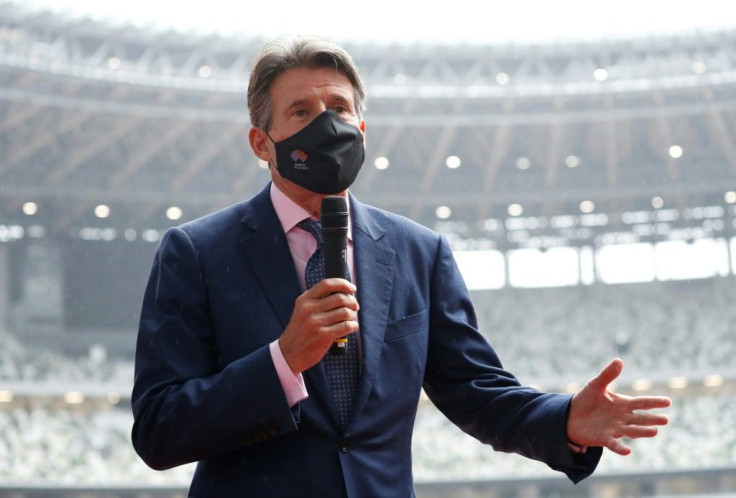 Coe wore a face mask as a protective measure during his visit