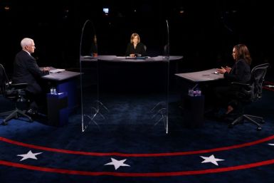 Democratic vice presidential nominee Senator Kamala Harris and US Vice President Mike Pence participate in the vice presidential debate in Salt Lake City, Utah