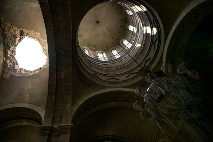 The rocket which struck the cathedral left a gaping hole in the roof