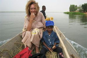 Sophie Petronin pictured working with children in Africa in an undated photo circulated by a group of supporters seeking her release