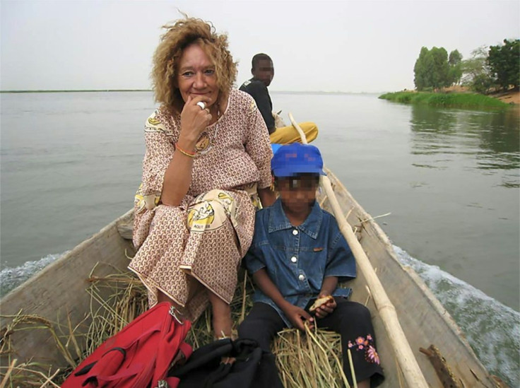 Sophie Petronin pictured working with children in Africa in an undated photo circulated by a group of supporters seeking her release