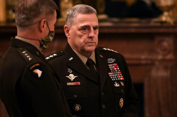 US Joint Chiefs Chairman Gen. Mark Milley (C) and other top Pentagon officers are self-quarantining after coming into contact with a Coast Guard admiral infected with Covid-19