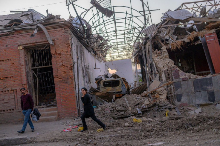 Armenian and Azerbaijan defence officials said fierce clashes continued overnight Thursday to Friday and reported further civilian deaths