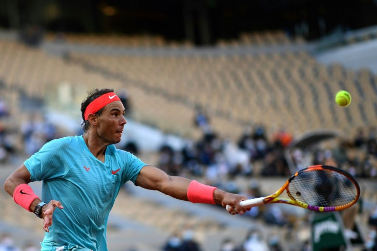 On top: Rafael Nadal returns the ball to Diego Schwartzman