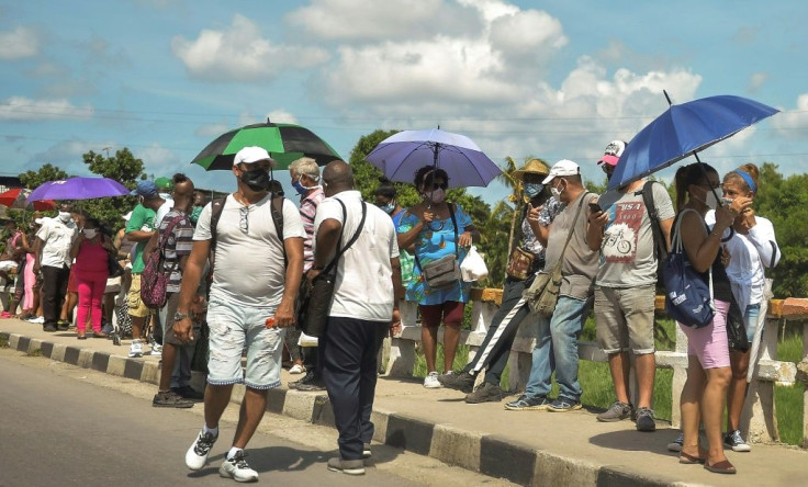 People queue to buy food at a store in the Cuban capital Havana in September 2020