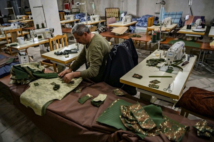 In a storeroom are boxes of supplies for the frontline soldiers: coffee, chocolate and cigarettes