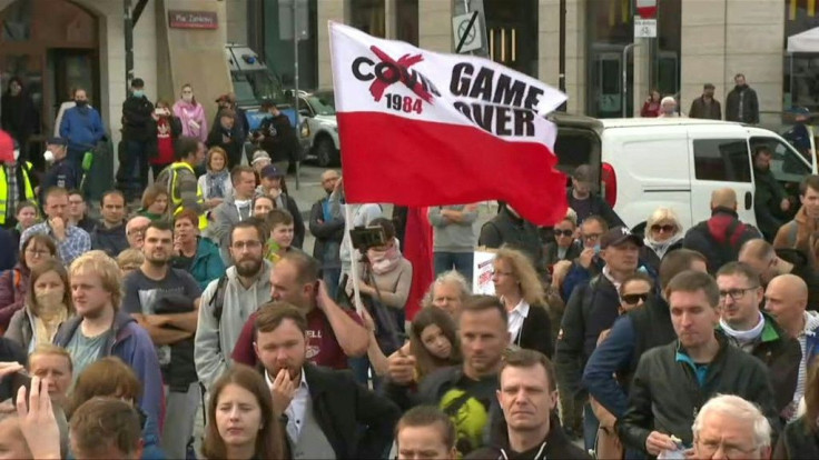 IMAGES People gather in Warsaw to protest against masks, now compulsory in all public spaces in Poland after coronavirus cases hit a new record daily high.