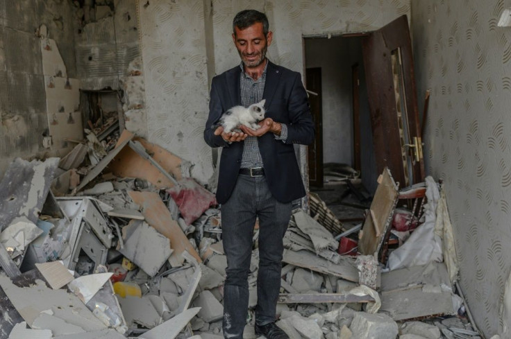 Terter resident Yasin Budakov found a kitten in the remains of his flat when he returned during the ceasefire