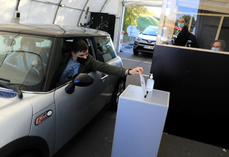 Lithuanians can vote at drive-through polling stations to limit the spread of the coronavirus