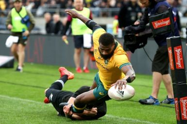 Australia's Marika Koroibete scores a try during the Bledisloe Cup rugby union match between New Zealand and Australia in Wellington on October 11, 2020.