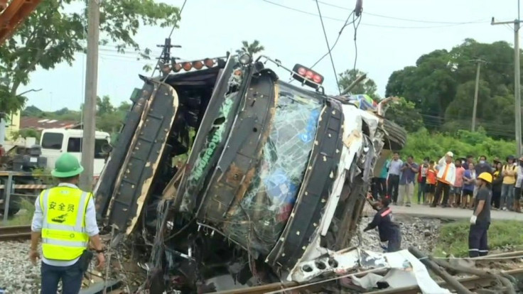 Images of Thailand site where 17 died in bus-train collision