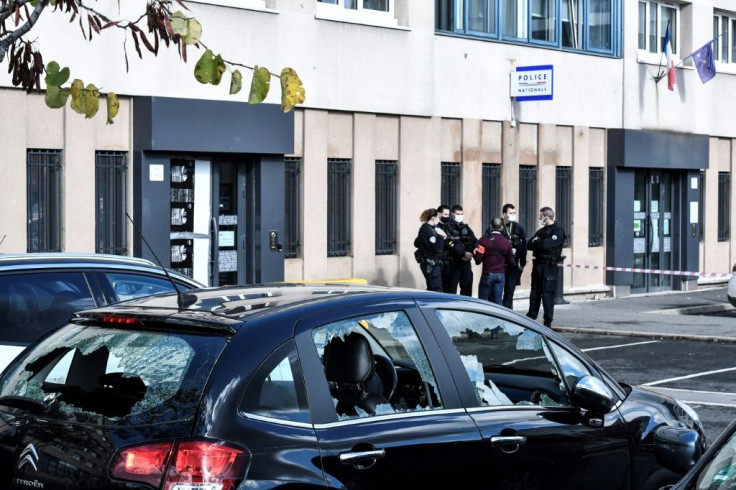 Vandalised cars outside the police station in  Champigny-sur-Marne, outside Paris, on Sunday.